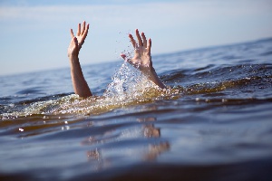 A courtesy Photo of a drowning person.